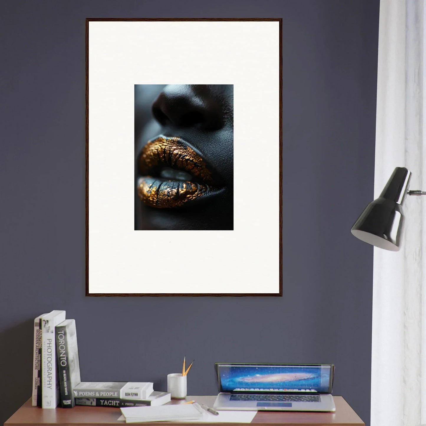 Framed wall art featuring gold-painted lips on a dark background for stylish room decor