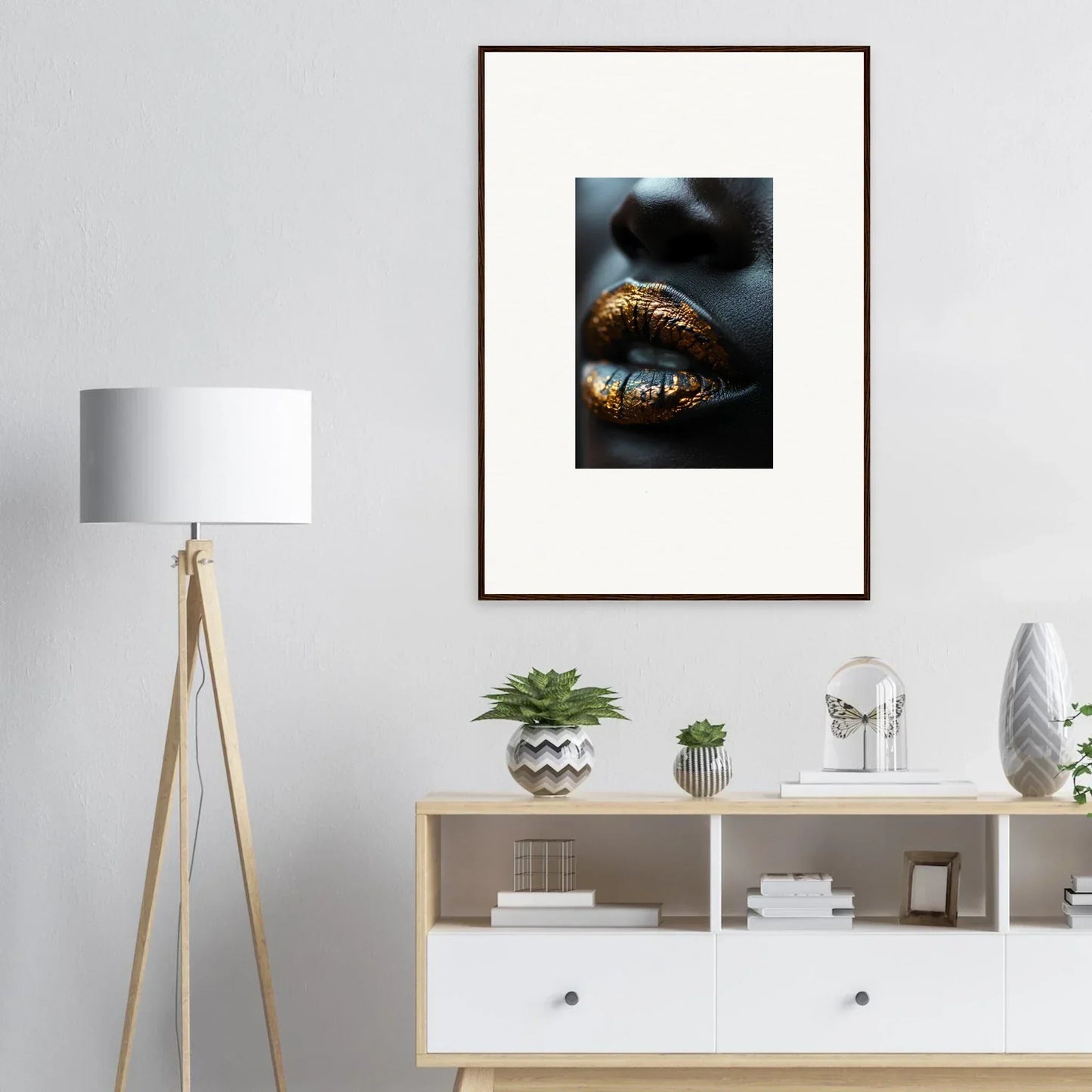 Framed wall art of gold-painted lips for elegant room decor with Gilt Glimmer theme