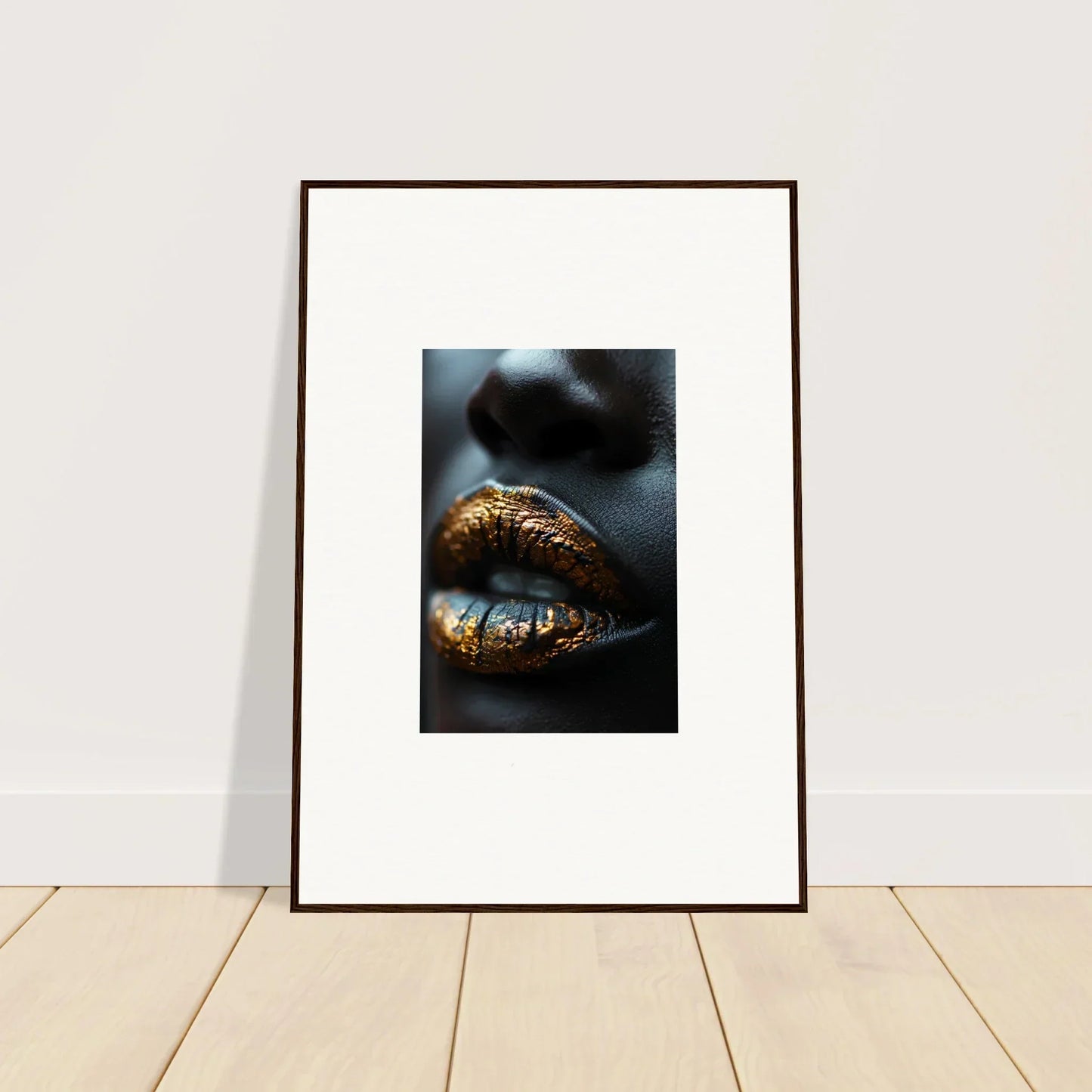 Framed wall art featuring gold-painted lips and glitter for elegant room decor