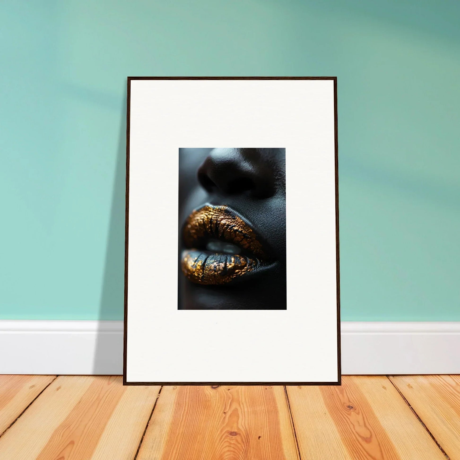 Framed wall art featuring gold-painted lips with glitter for luxe room decor