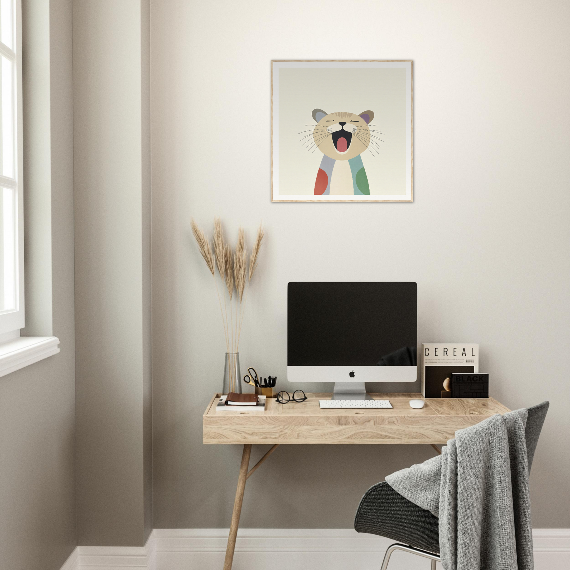 Minimalist wooden desk with iMac and artwork above, featuring Majestic Feline Viva design