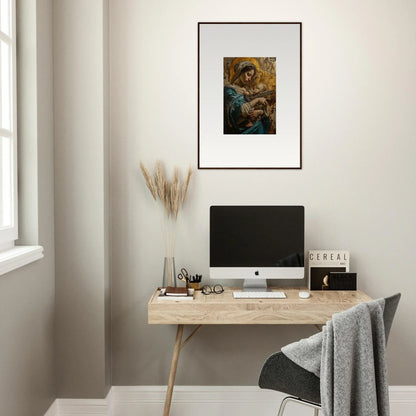 Minimalist home office with a wooden desk, computer, and framed wall art for Halo Ricochet