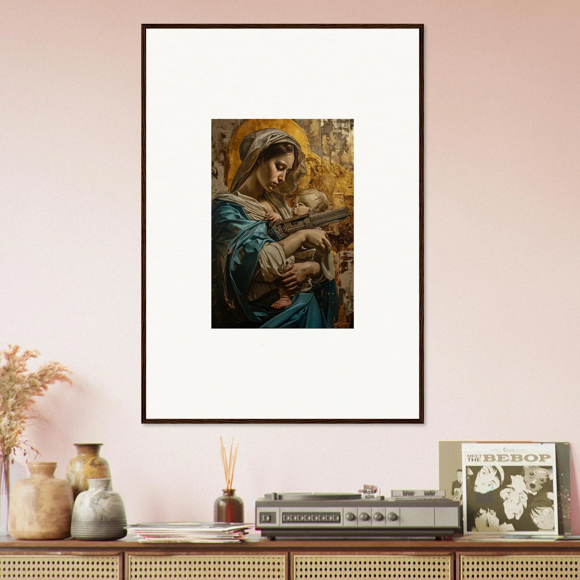 Framed wall art of a woman in blue and gold tones holding a baby, Halo Ricochet