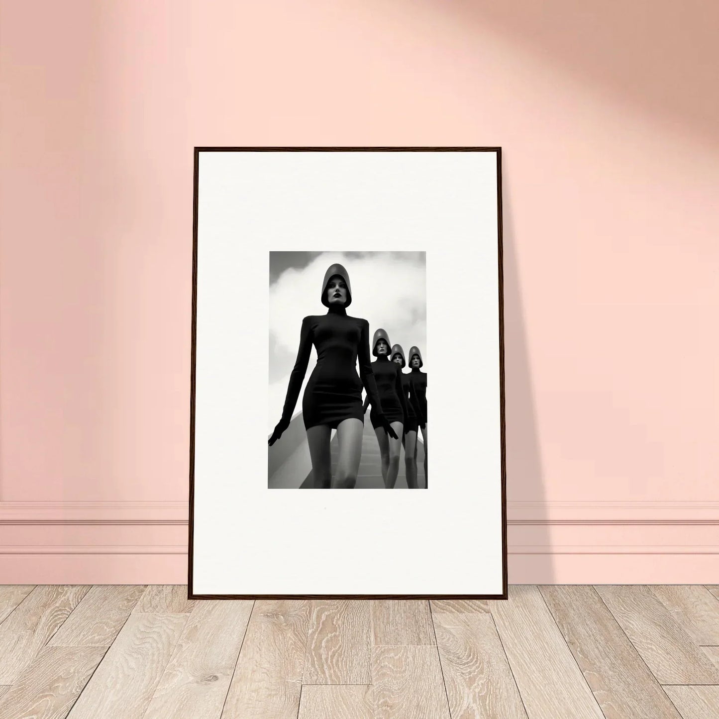 Framed black and white photograph of women in short dresses for trendy room decor