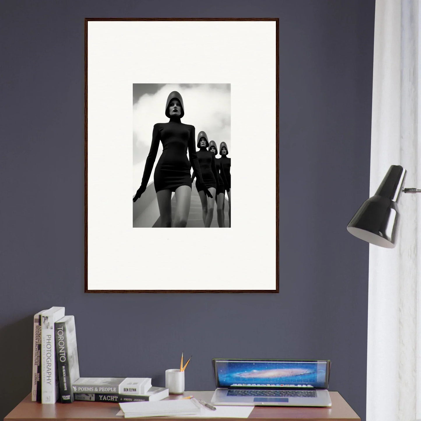 Framed black and white Venus Phantoms wall art of silhouetted figures in dresses