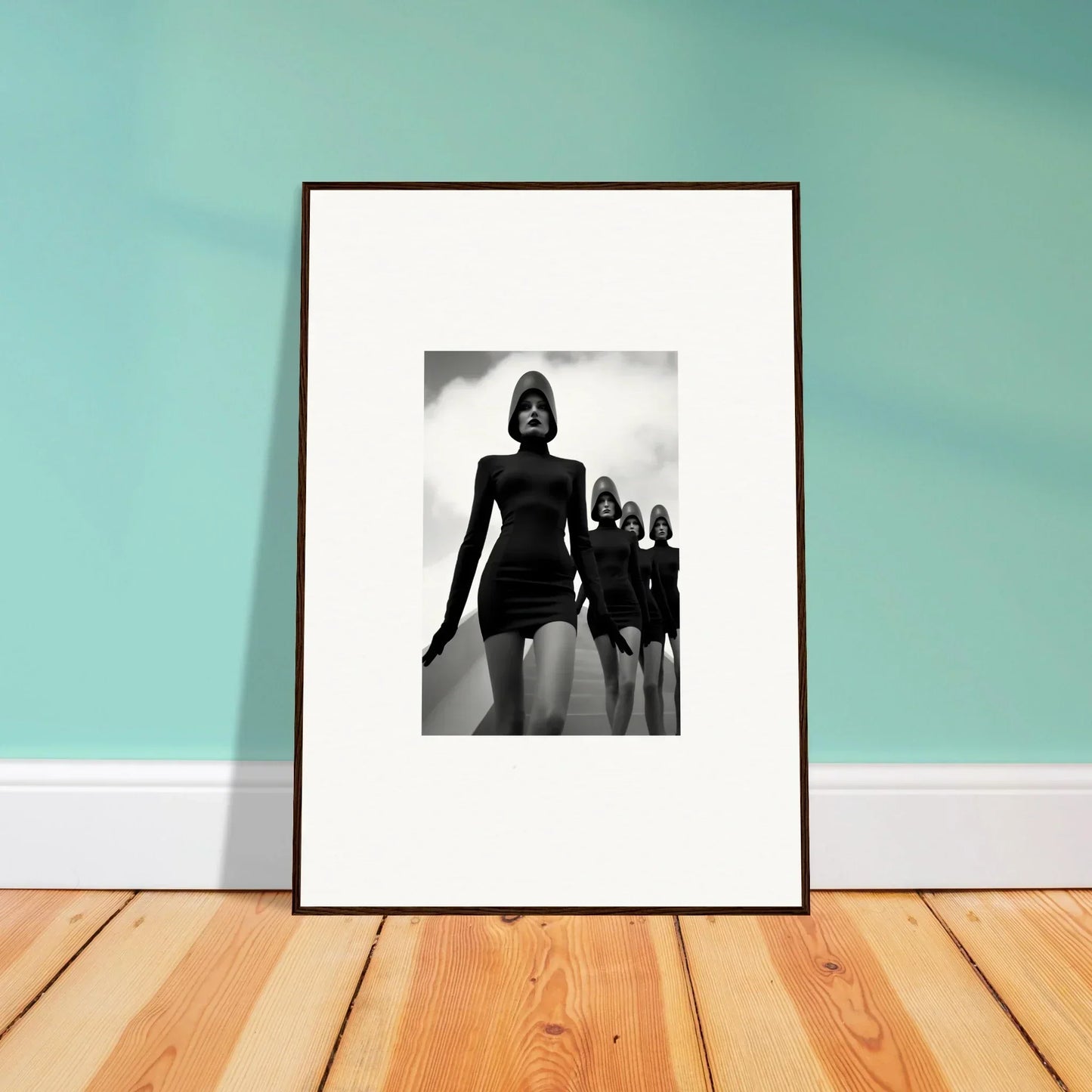 Framed black and white photograph of silhouetted figures for stylish Venus Phantoms room decor