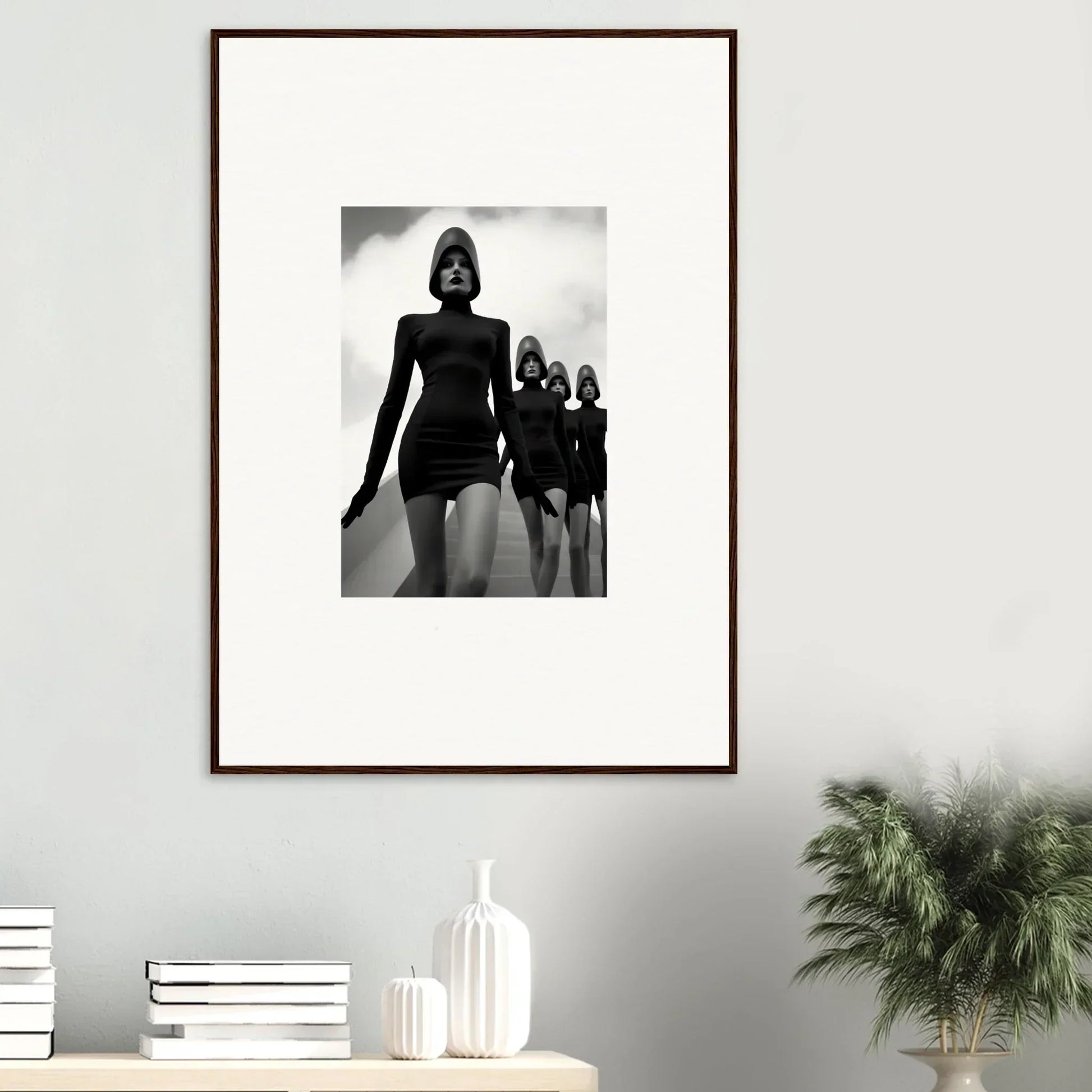 Framed black and white photograph of models on a runway for stylish room decor