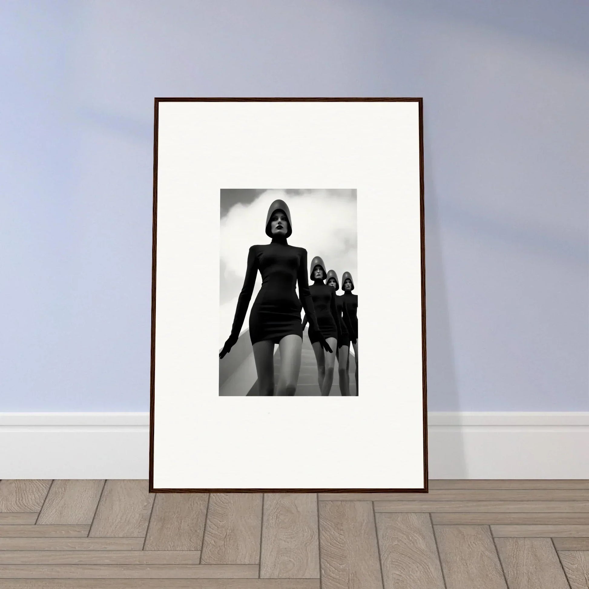 Framed black and white Venus Phantoms wall art with silhouetted figures for room decor