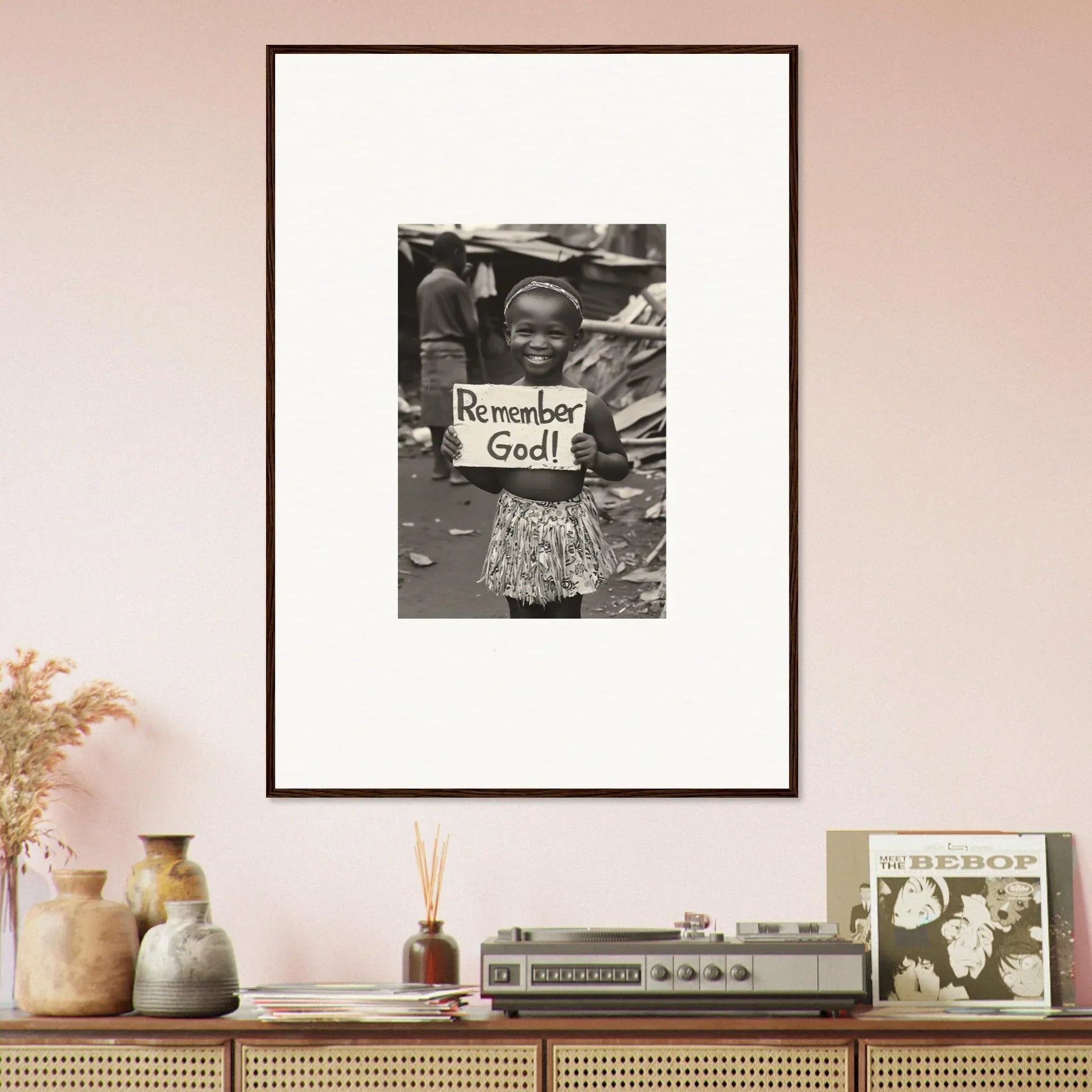 Framed black and white photo of a child with a Remember God sign for premium framed wall art