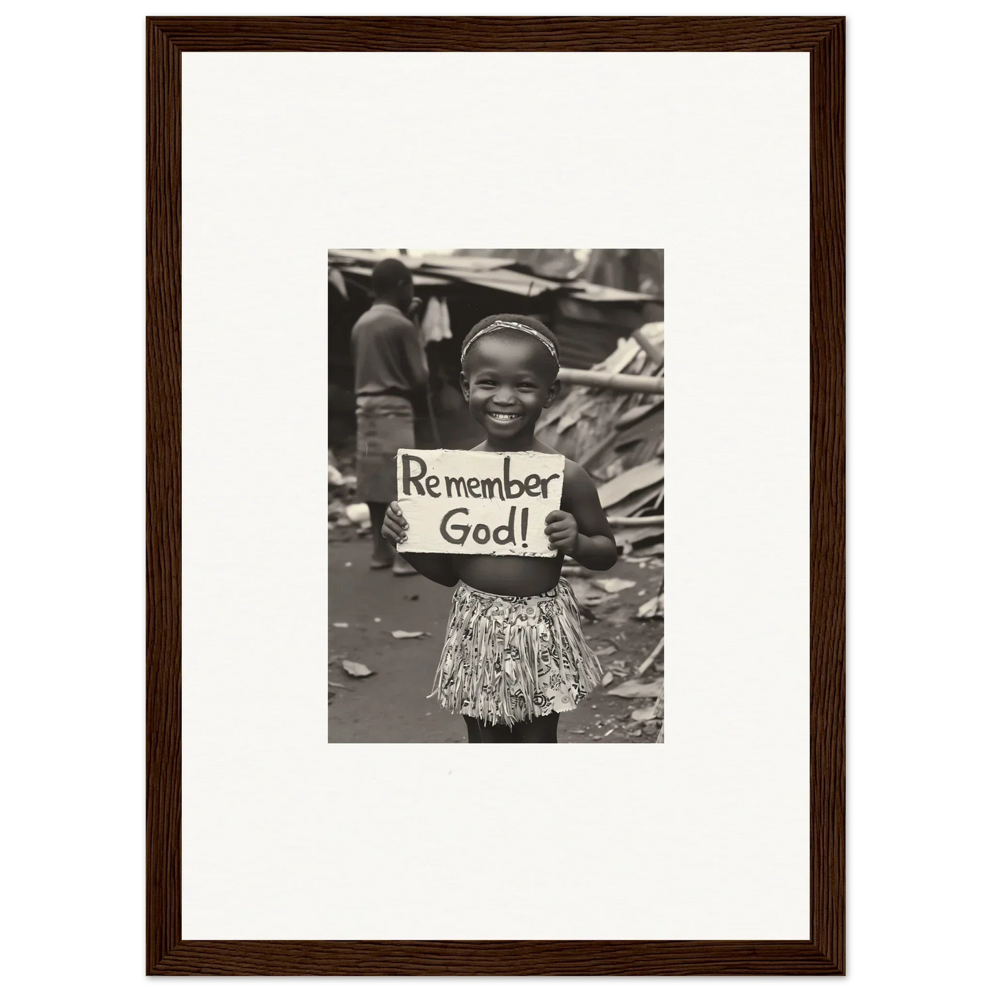 Framed wall art of a child with a Remember God sign in special edition art