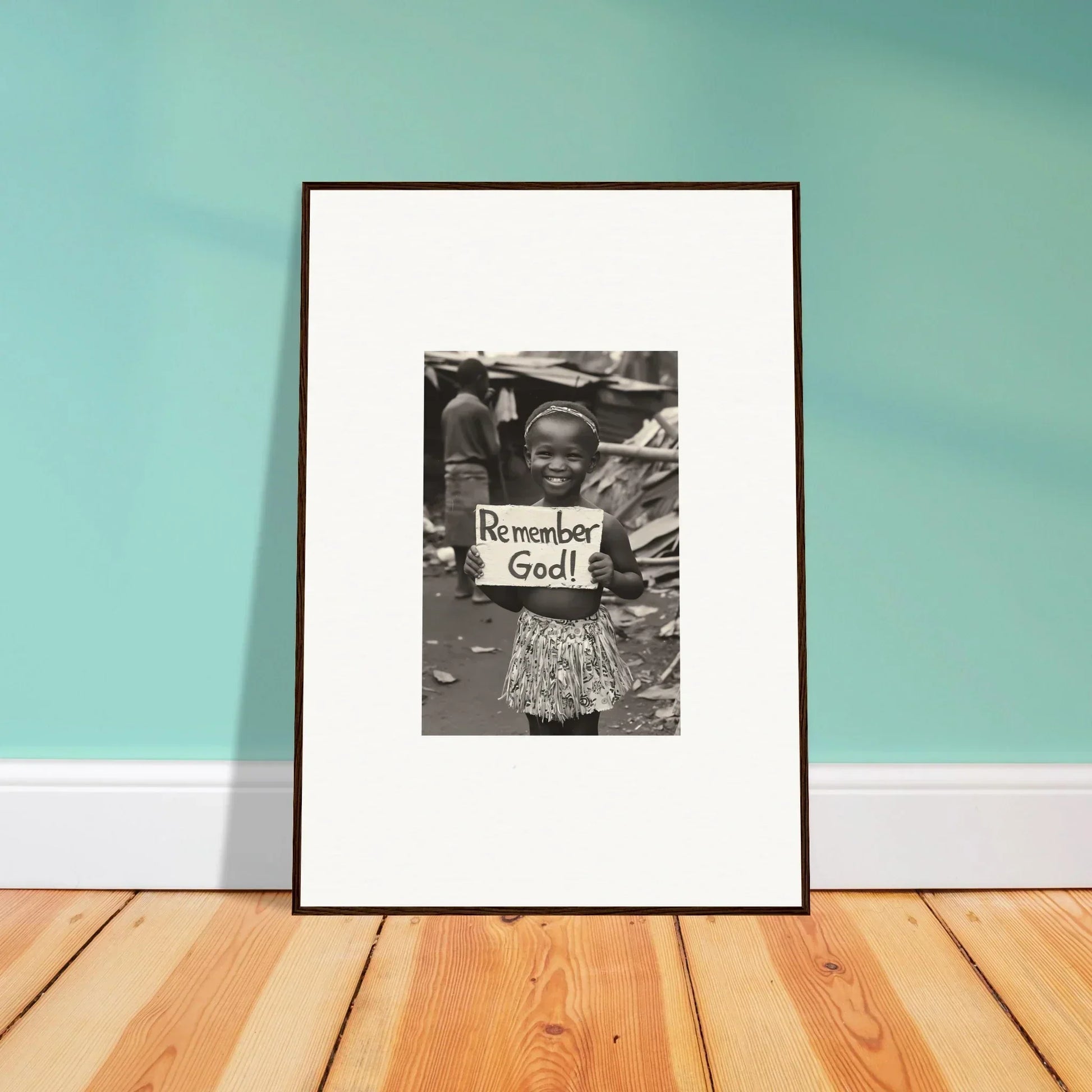 Framed black and white photograph of a protest sign in Memory Yet Flowered special edition art™