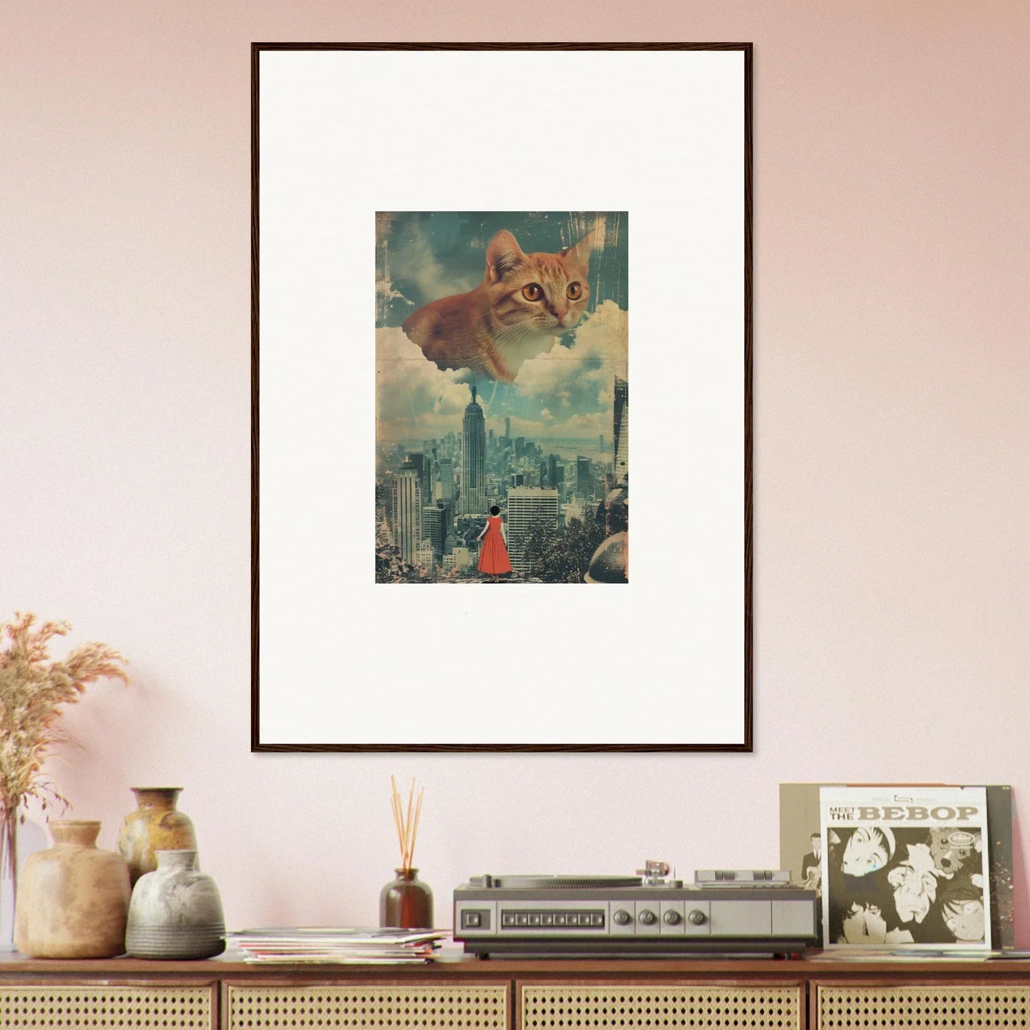 Framed surrealist wall art of a giant cat face in cloud ascent over a cityscape