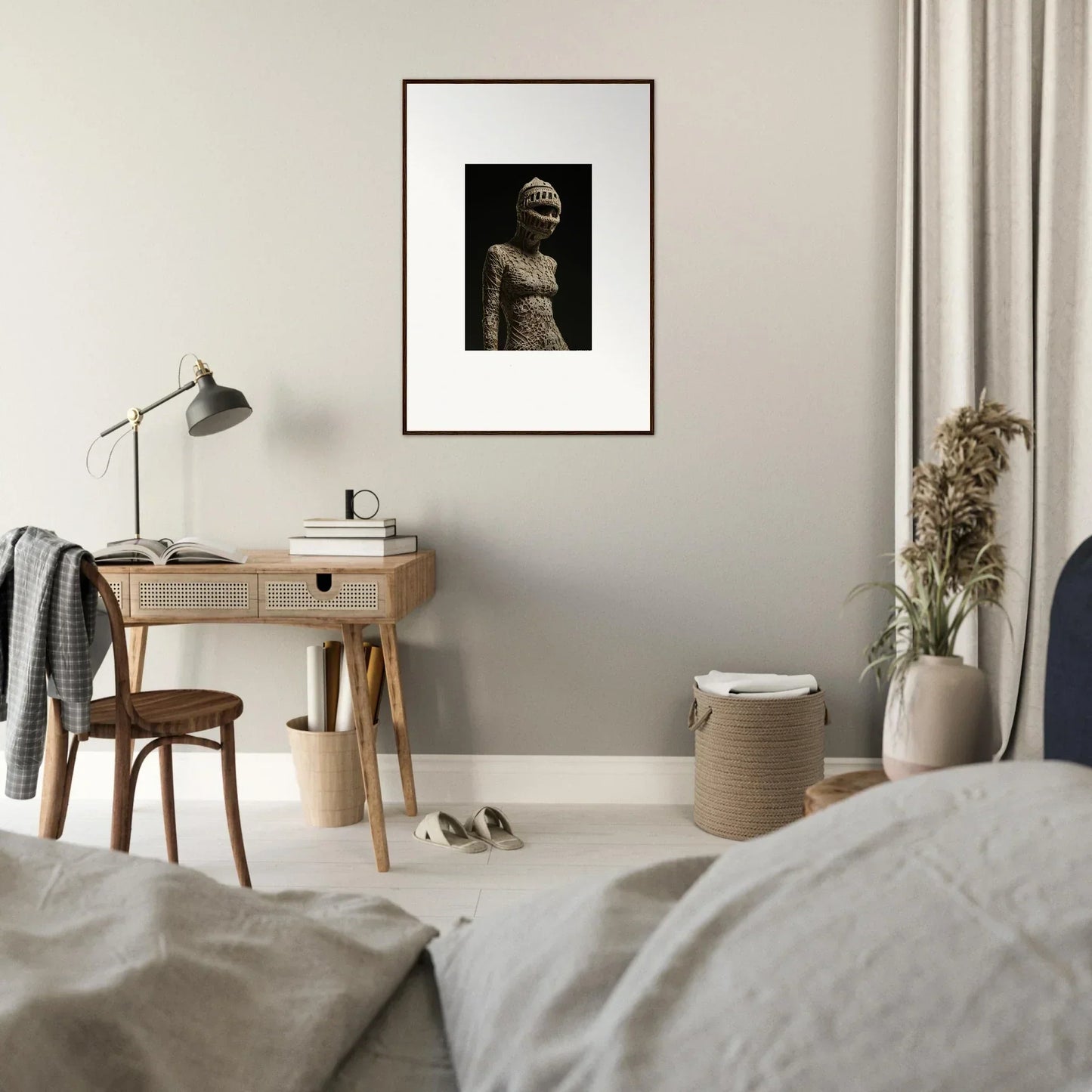 Framed black and white wall art of a classical sculpture bust for elegant room decor