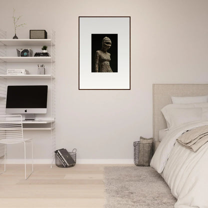 Minimalist bedroom decor featuring white walls, floating shelves, and framed wall art