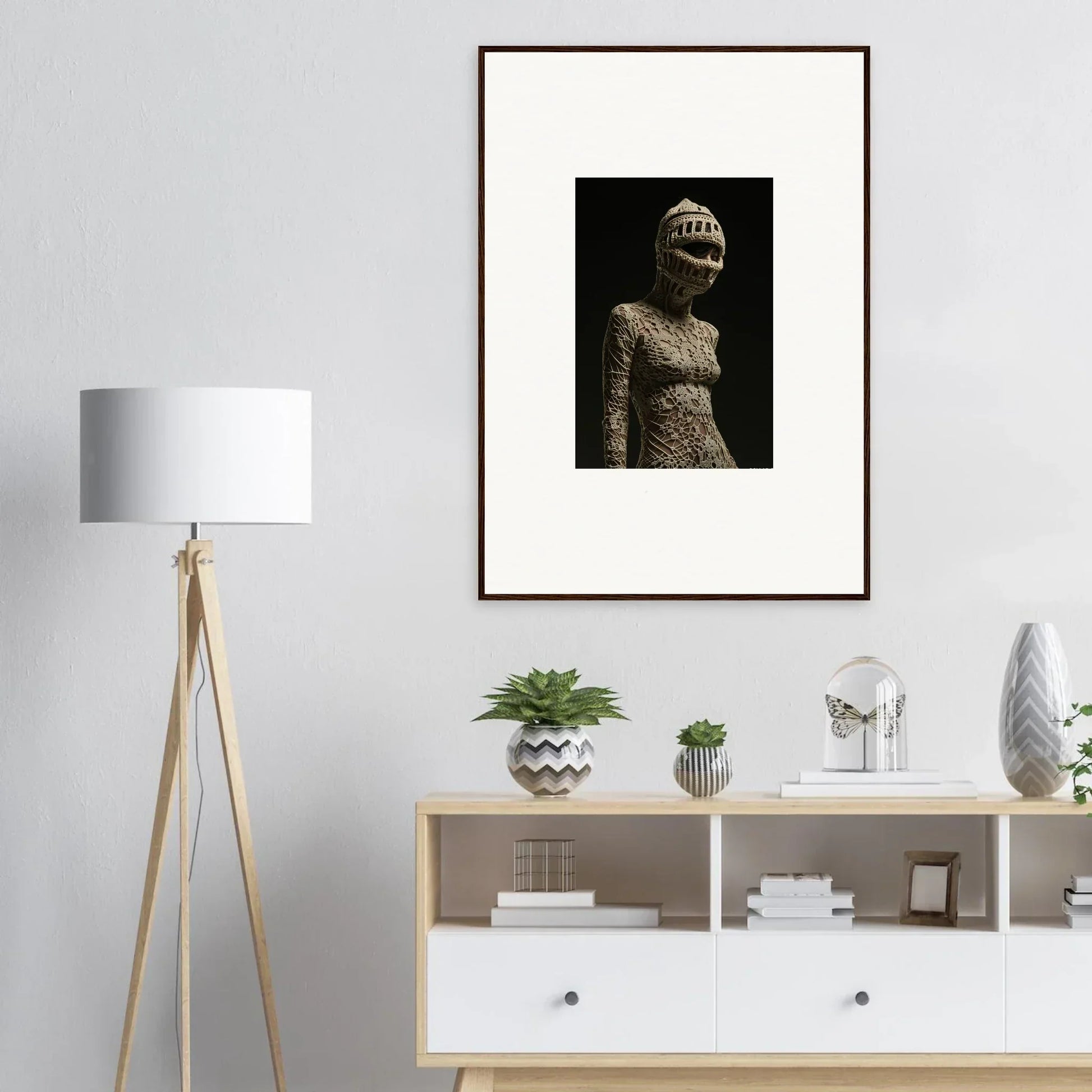 Framed wall art of textured figure with spherical head for unique room decor