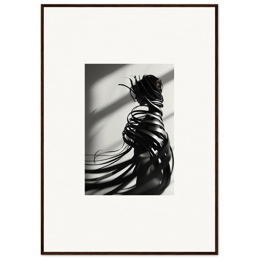 Artistic black and white canvas print of a person’s back with flowing hair and shadows