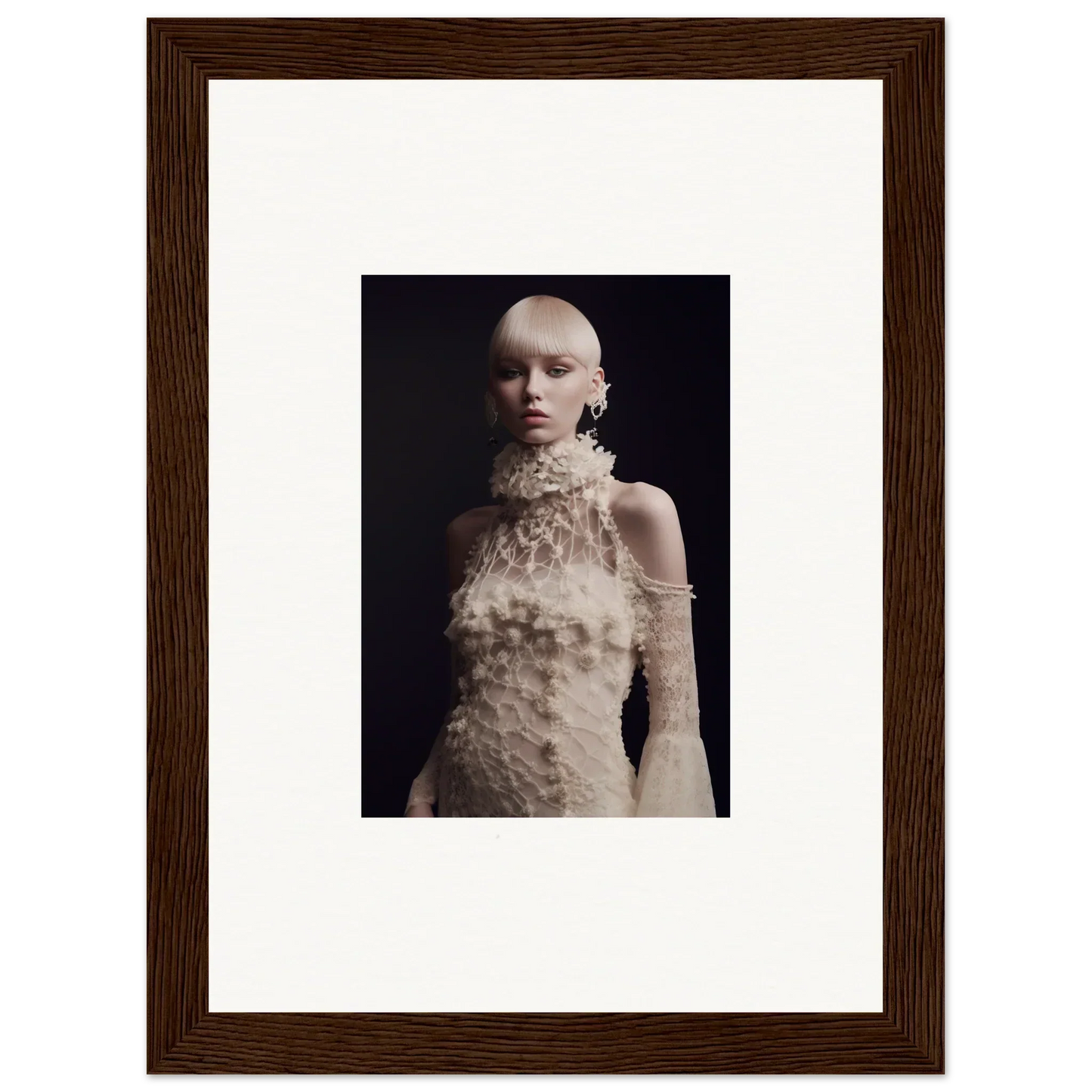 Framed wall art of a pale figure in an ornate garment, perfect for room decor