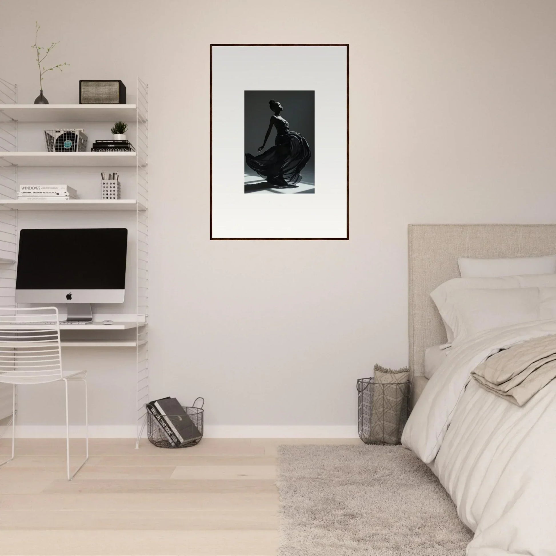 Minimalist bedroom with white walls, floating shelves, and a framed black and white photograph.