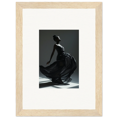 Graceful dancer in a flowing black dress captured mid-movement.