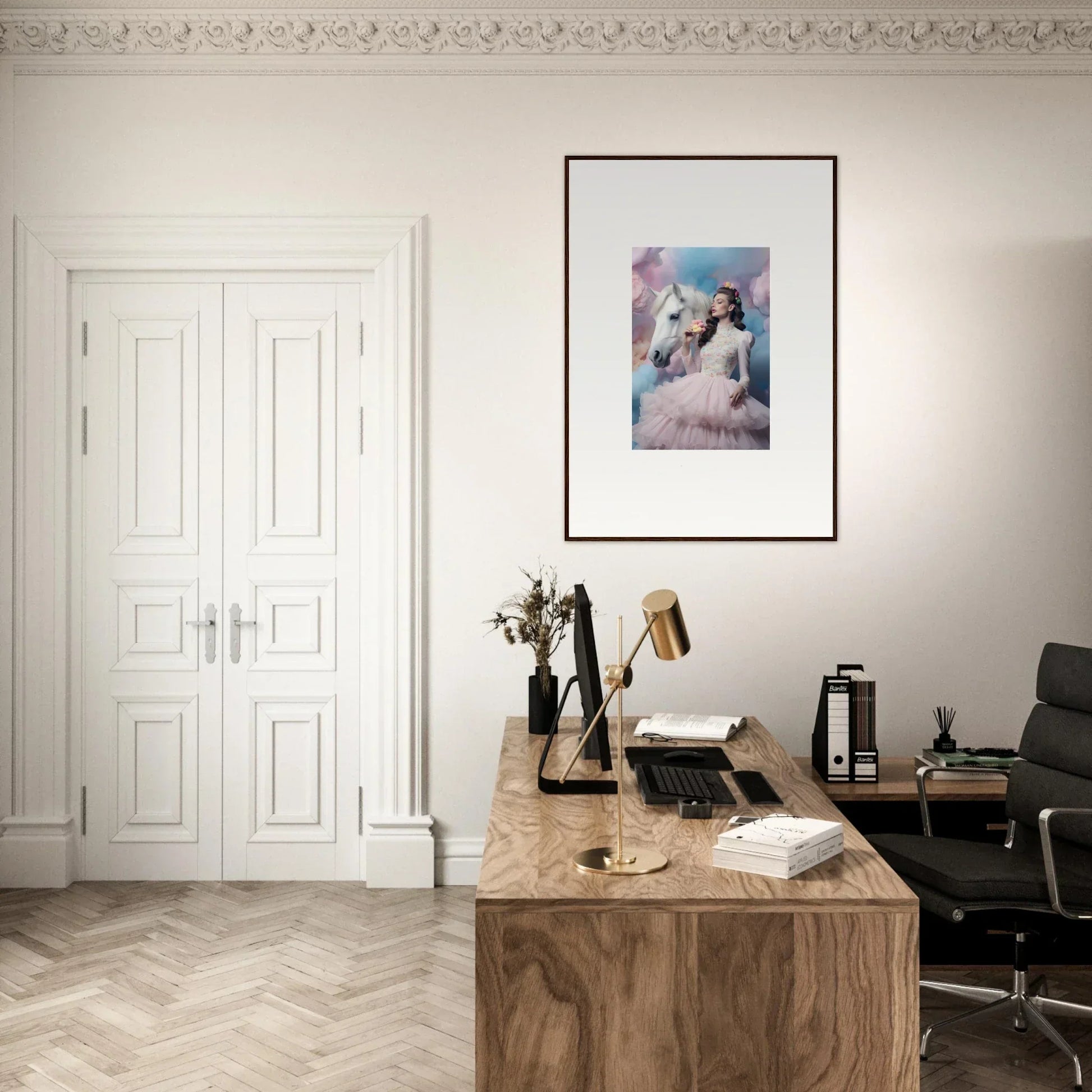 Elegant home office workspace with a wooden desk and framed artwork.