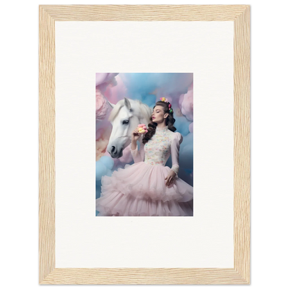 Framed photograph of a woman in a pink tulle gown posing with a white horse against a dreamy sky backdrop.