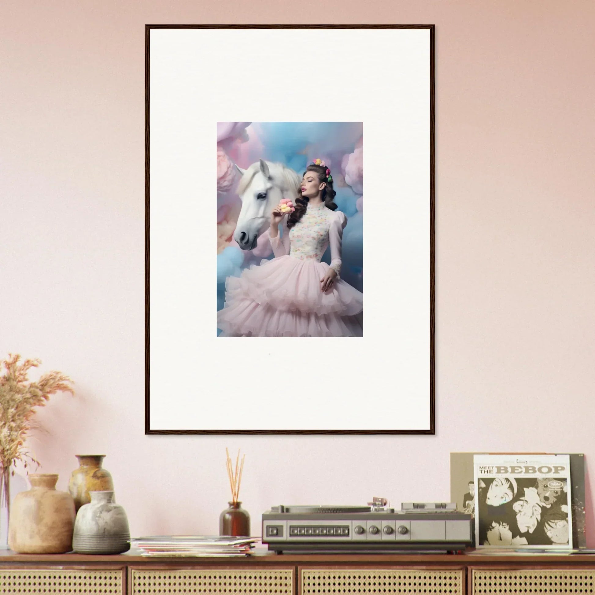 Framed photograph of a woman in a pink dress posing with a white horse against a dreamy pastel background.