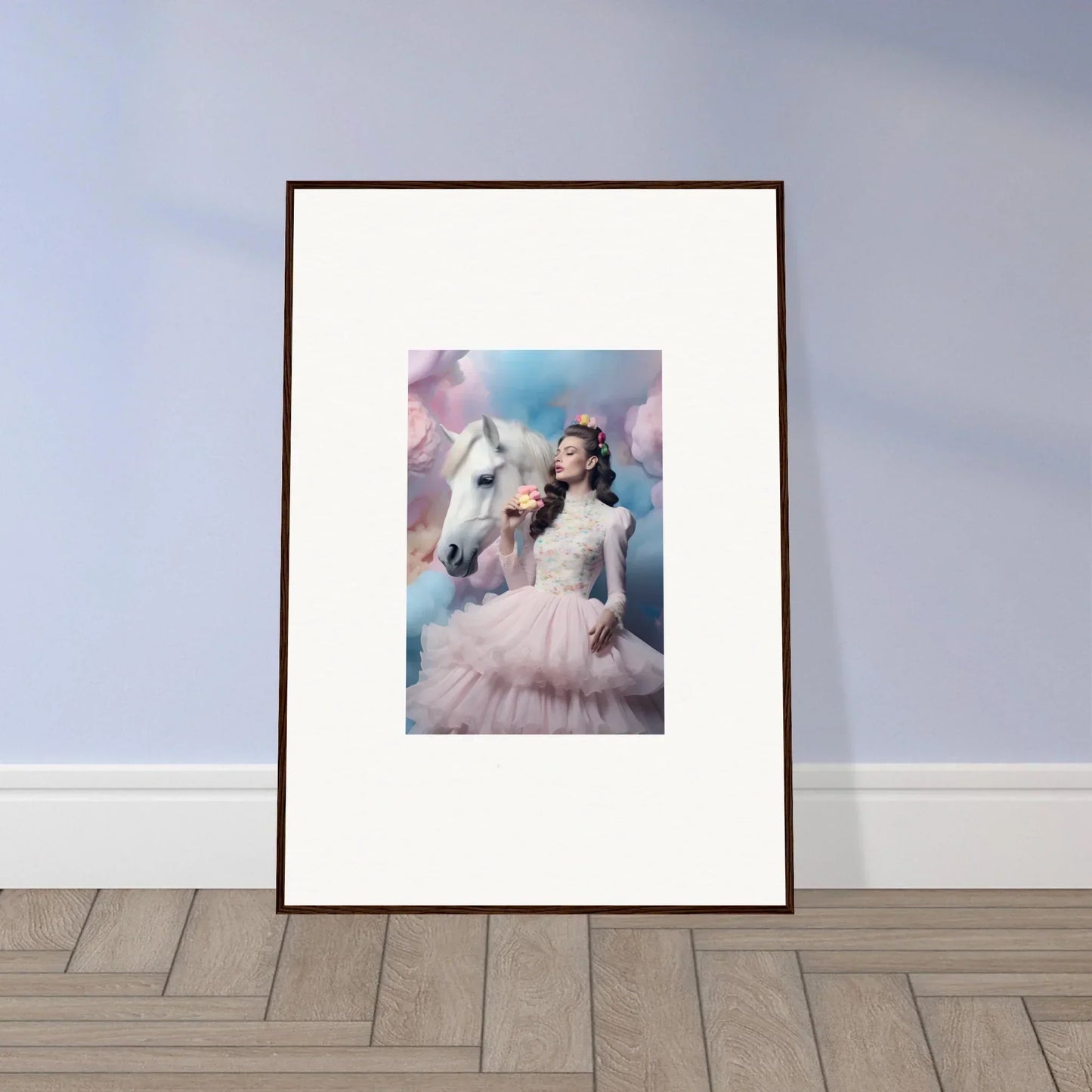 Framed artwork depicting a woman in a pink dress with a white horse against a dreamy background.