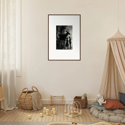 Framed black and white photograph of a figure in a doorway.