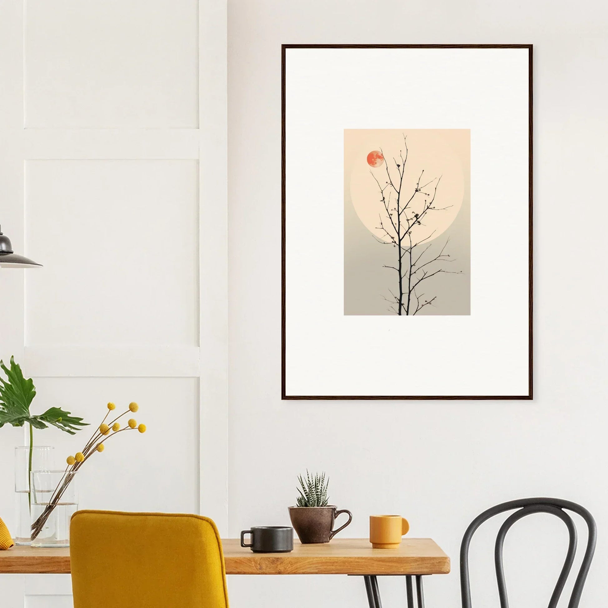 Framed minimalist canvas print of a bare tree branch and red sun for room decoration