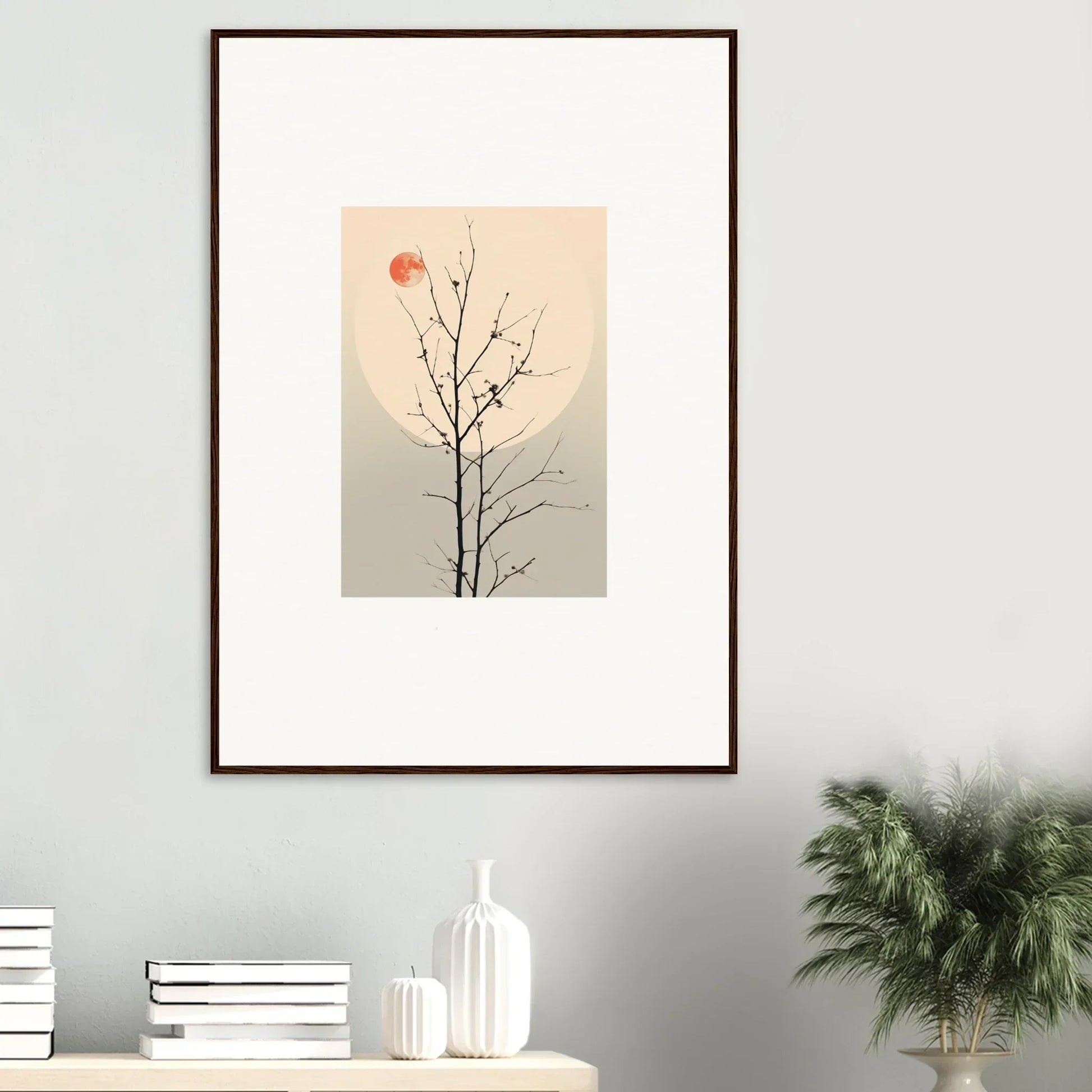 Framed minimalist canvas print of a bare tree branch with a red sun for room decoration