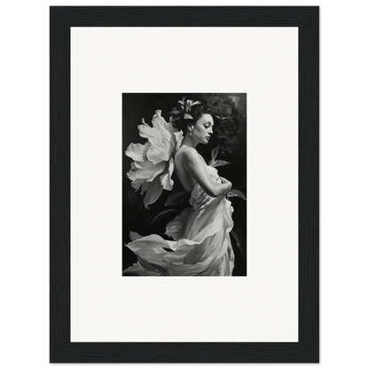 Black and white canvas print of a woman in a flowing dress with a flower for room decoration