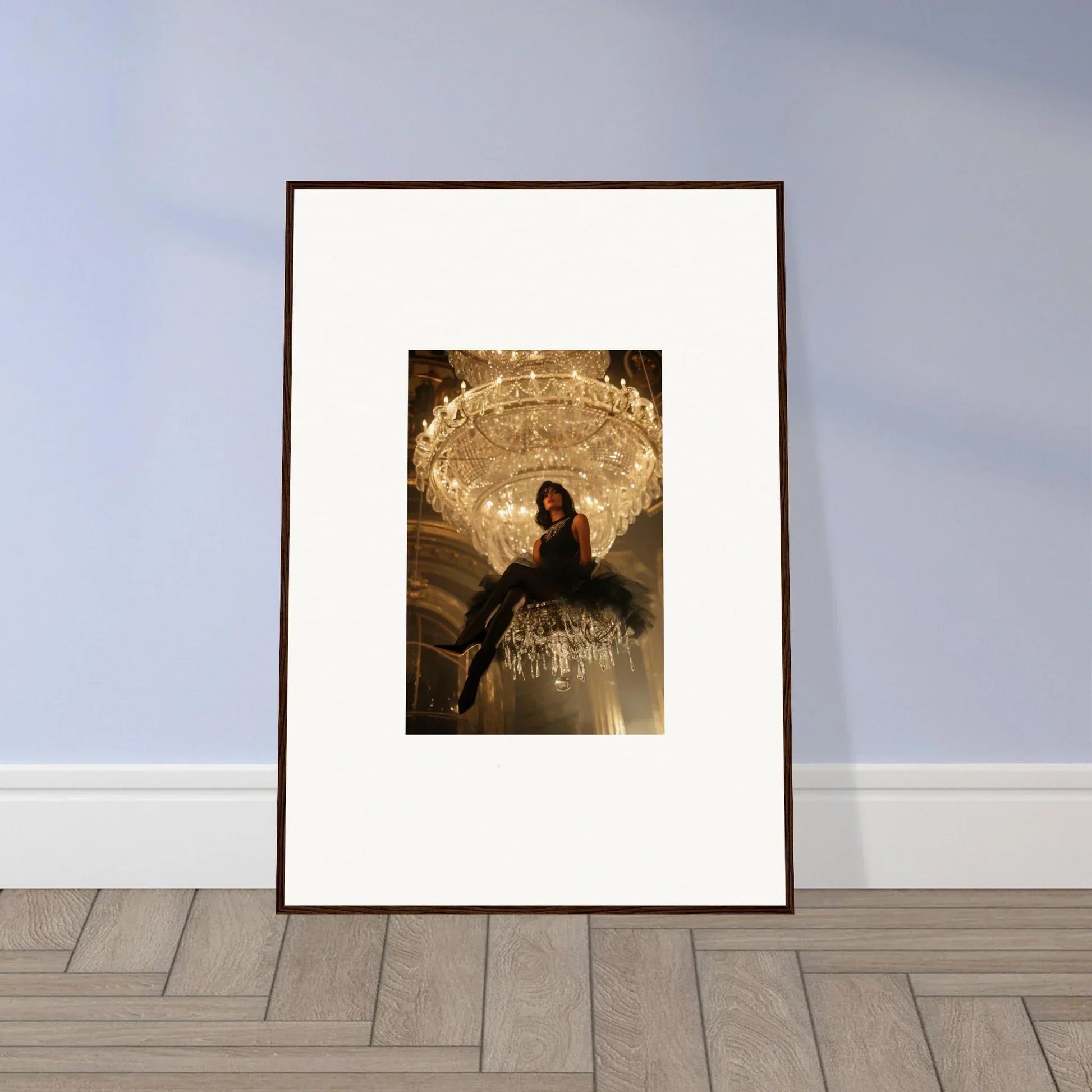 Framed photograph of a person on a chandelier for unique noir majesty room decoration