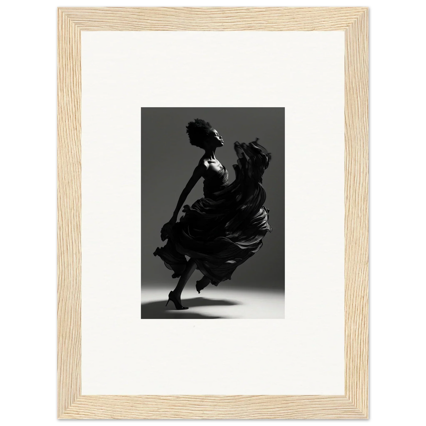 Silhouette of a dancer in a flowing dress captured mid-movement.