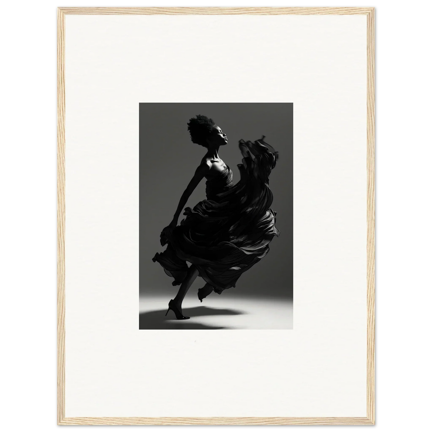 Silhouette of a dancer in a flowing dress captured mid-twirl.