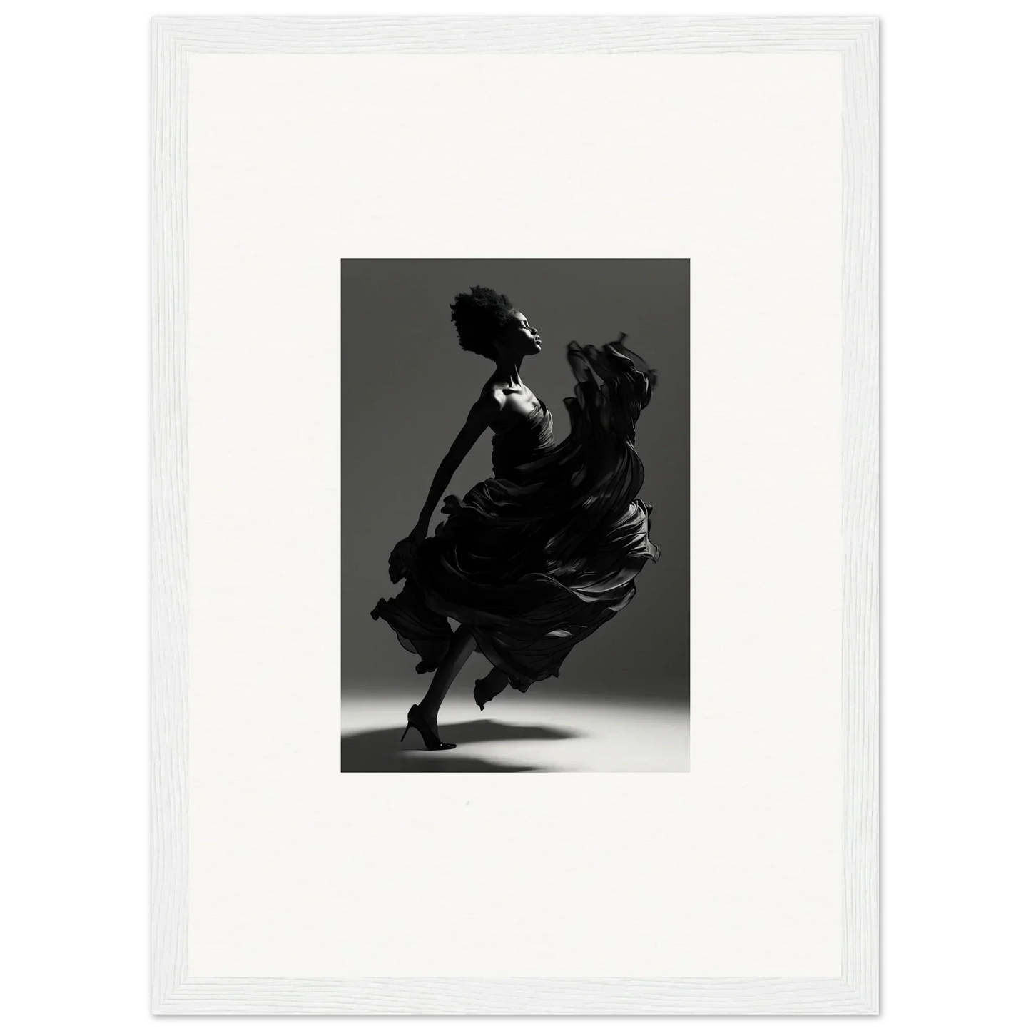 Silhouette of a dancer in a flowing dress captured mid-twirl.