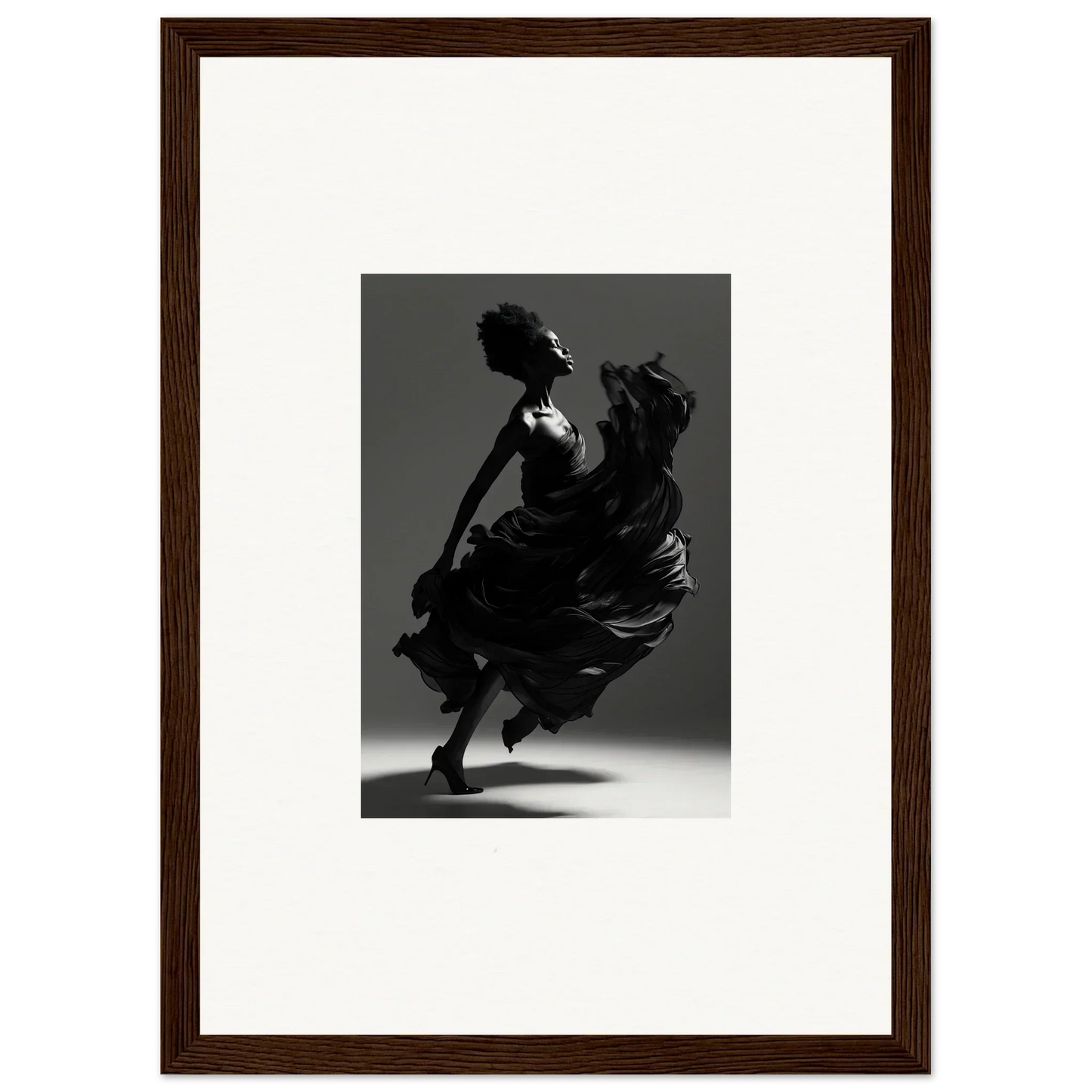 Silhouette of a dancer in a flowing dress captured mid-twirl.