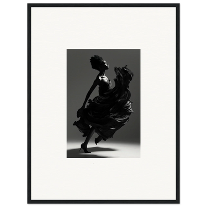 Silhouette of a dancer in a flowing dress captured mid-motion.