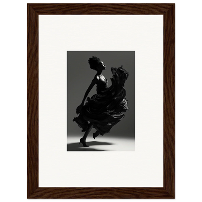 Silhouette of a dancer in a flowing dress captured mid-twirl.