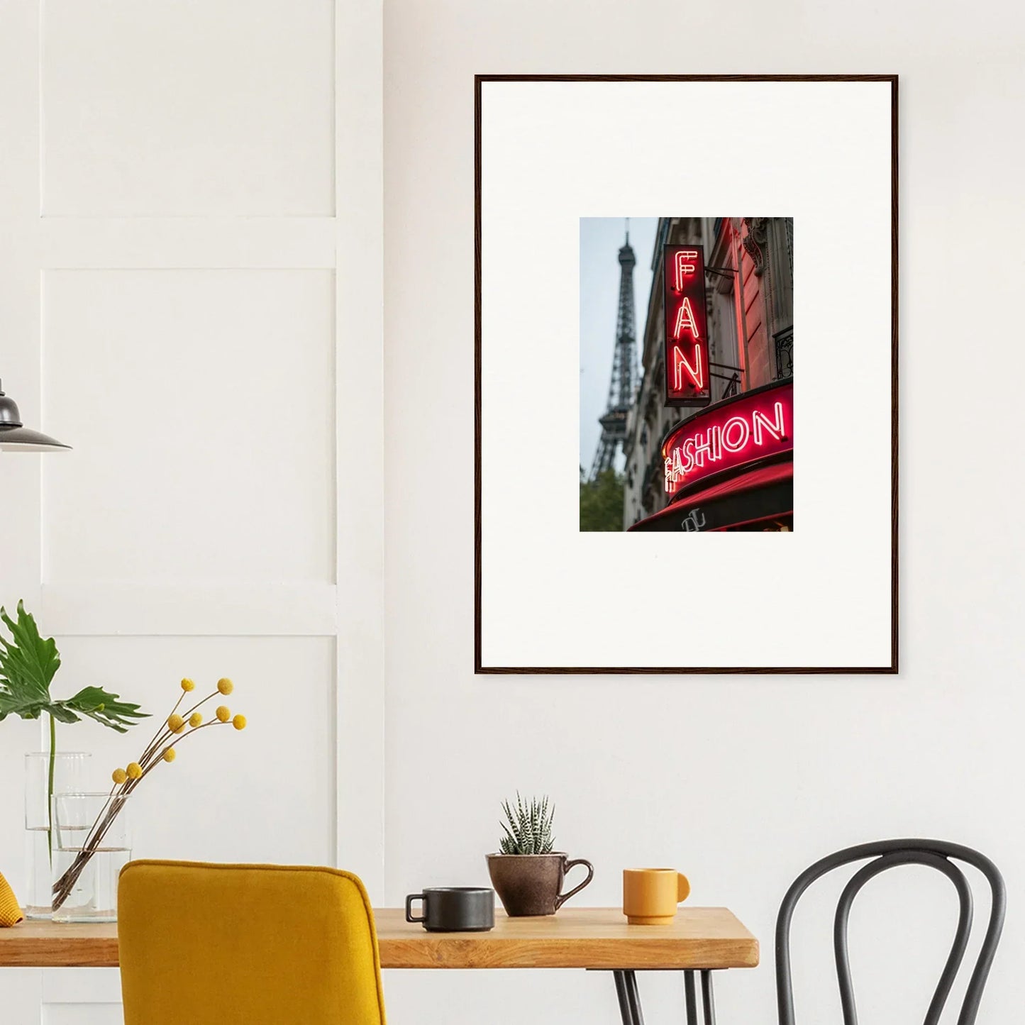 Framed wall art of a Parisian street scene with neon signs and the Eiffel Tower