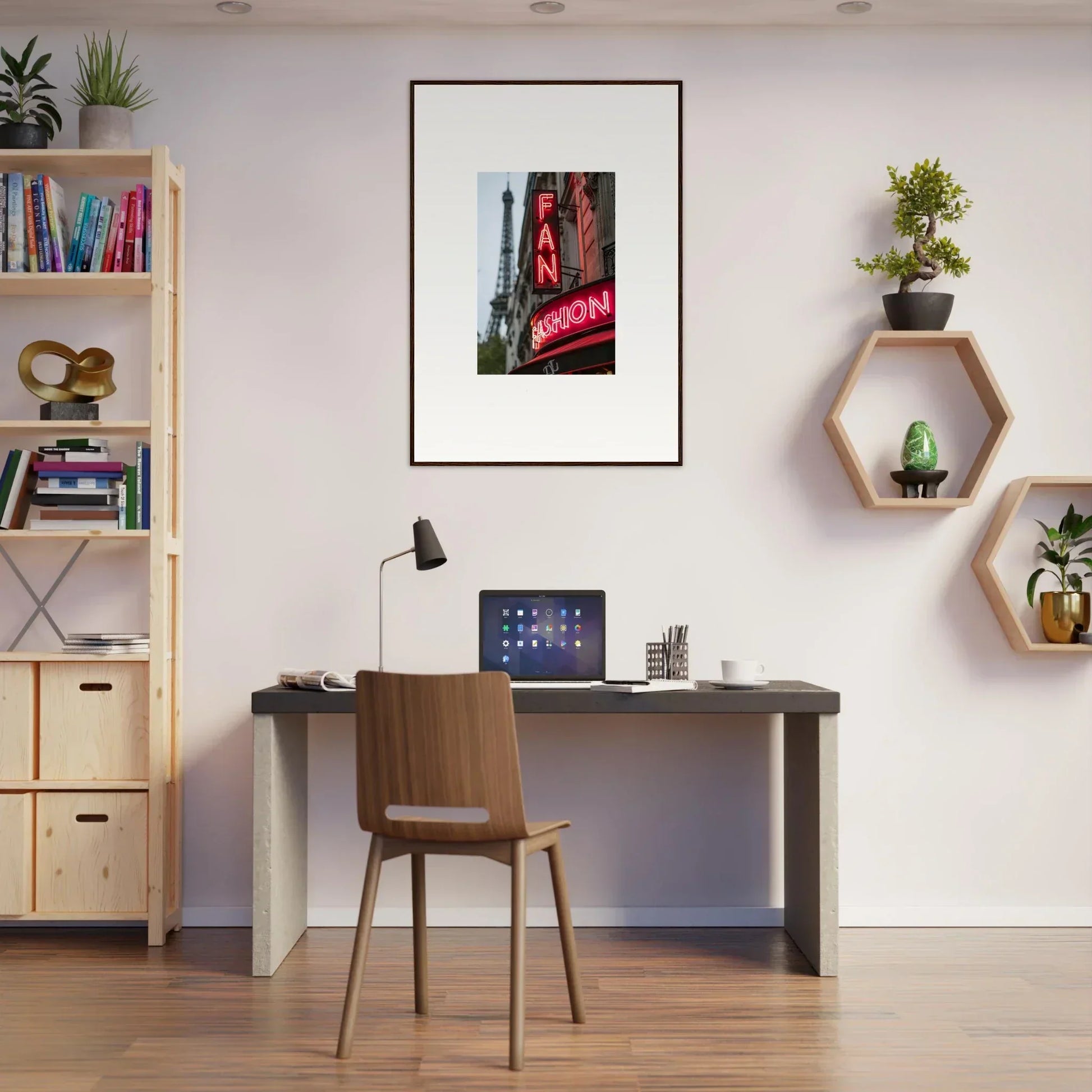 Home office workspace featuring desk, chair, and stylish framed wall art decor