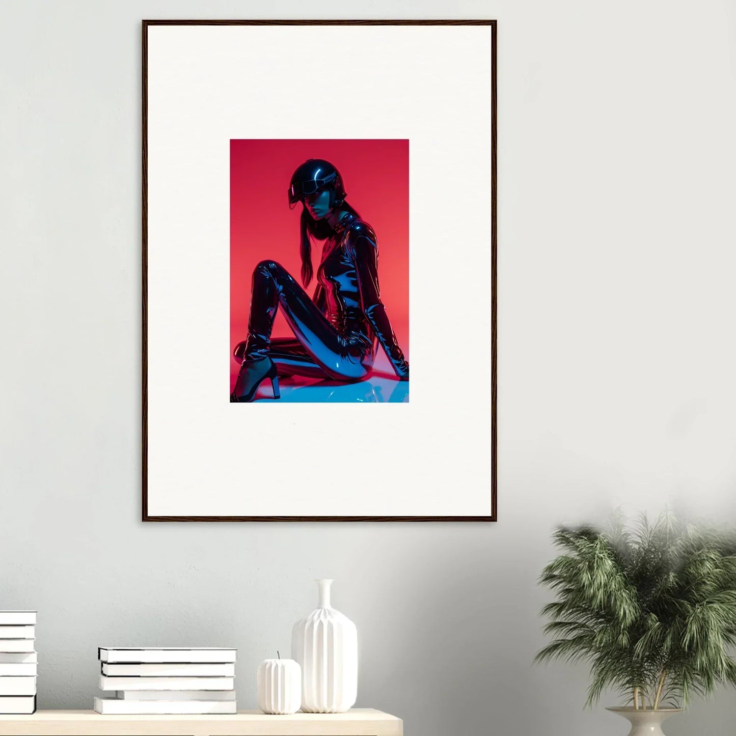 Framed wall art of a blue-tinted nude figure in a vibrant red background for Noir Mirage room decor