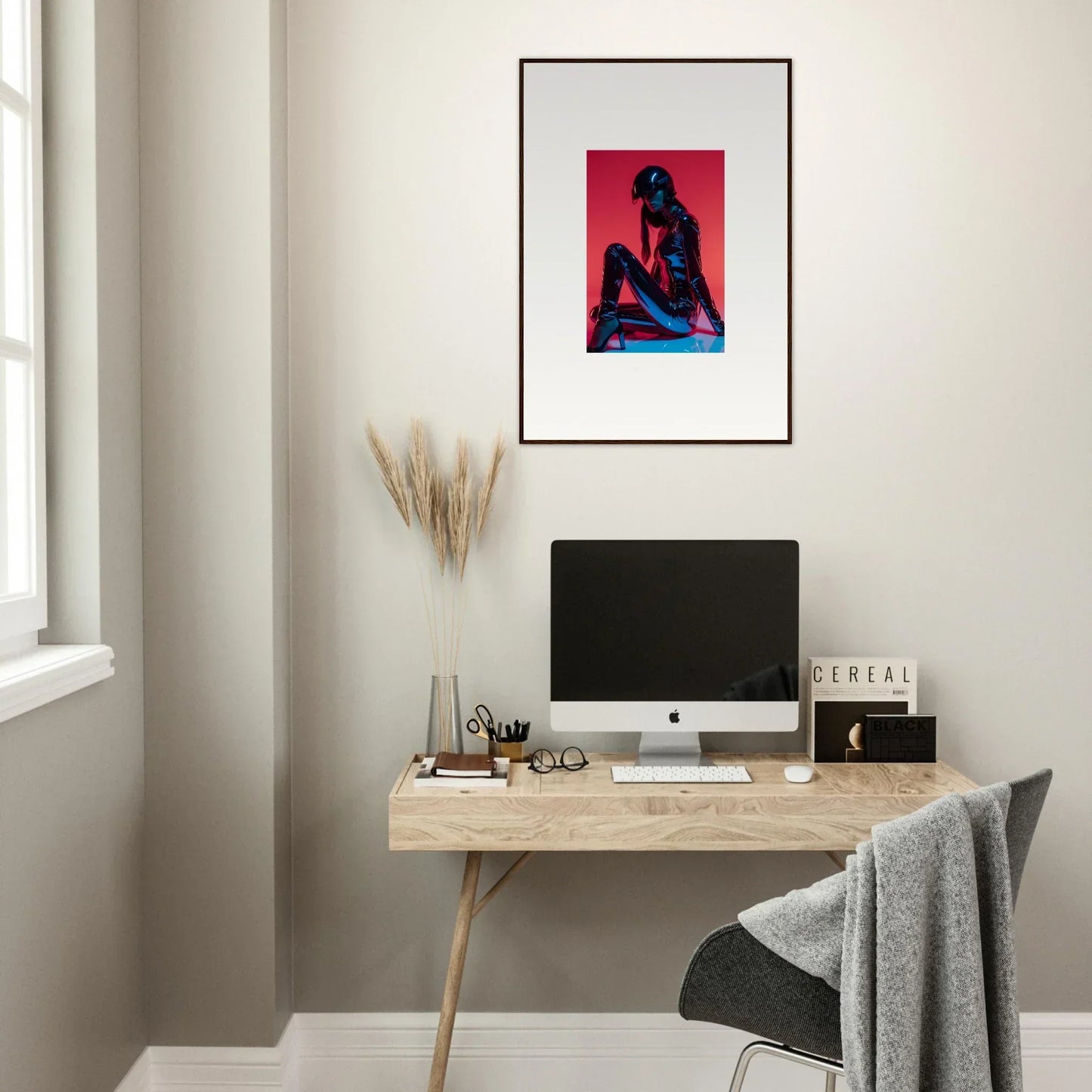 Minimalist home office with Noir Mirage wall-mounted desk and framed wall art