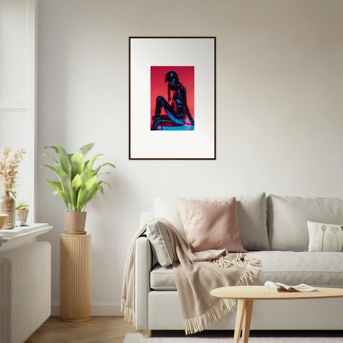 Framed wall art of a silhouetted figure on vibrant red as modern Noir Mirage room decor