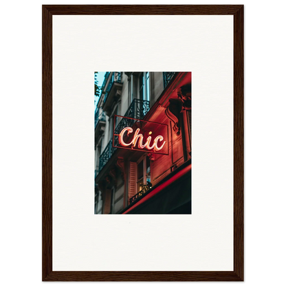 Illuminated neon sign reading Chic on red building, perfect for Parisian Reverie room decor