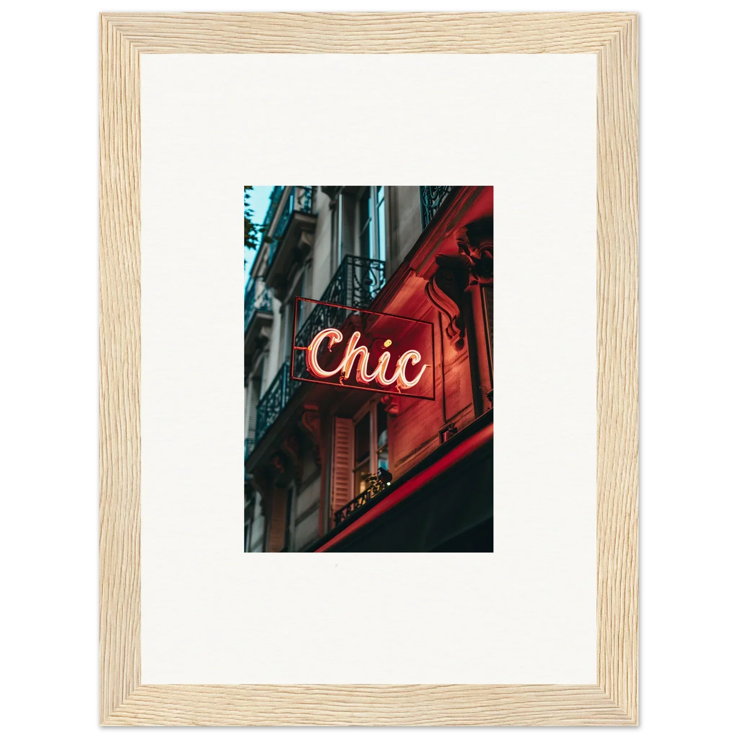 Framed wall art of a neon Chic sign adds Parisian reverie to stylish room decor