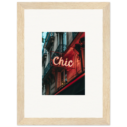 Framed wall art of a neon Chic sign adds Parisian reverie to stylish room decor