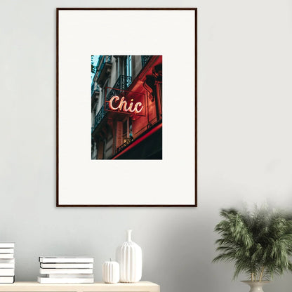 Framed wall art of a red neon Chic sign for Parisian reverie room decor