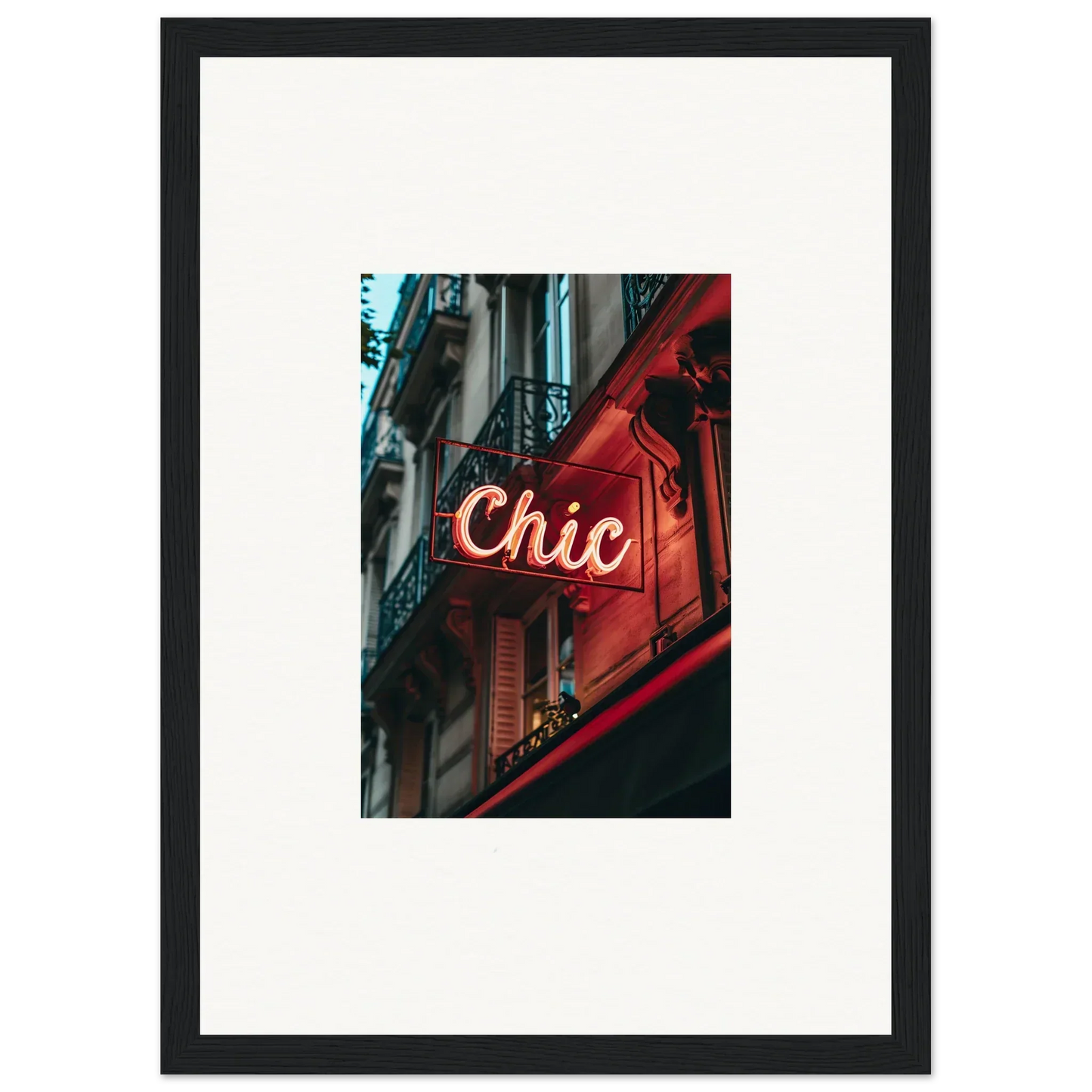 Neon sign reading Chic on a red-lit building for Parisian Reverie room decor