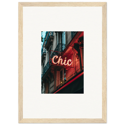 Framed wall art of a neon Chic sign, perfect for Parisian reverie room decor