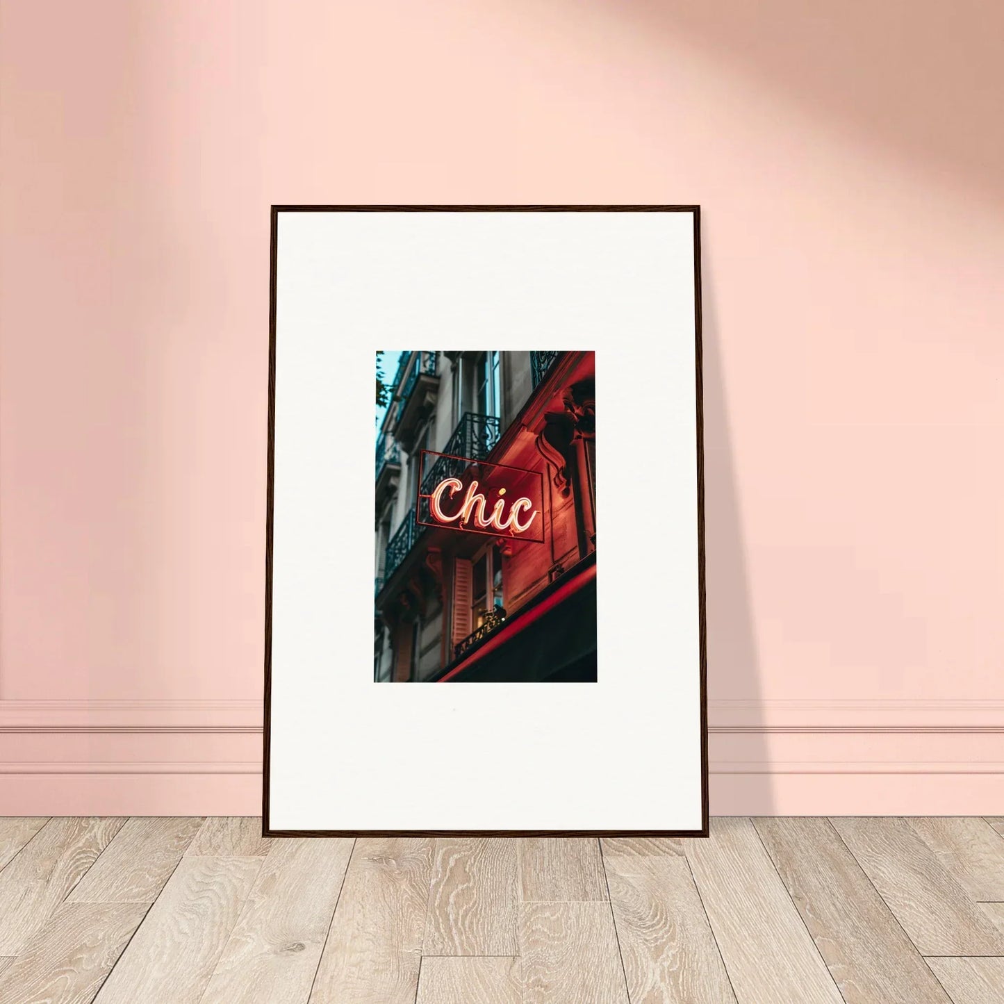 Framed wall art of a neon Chic sign, perfect for Parisian reverie room decor